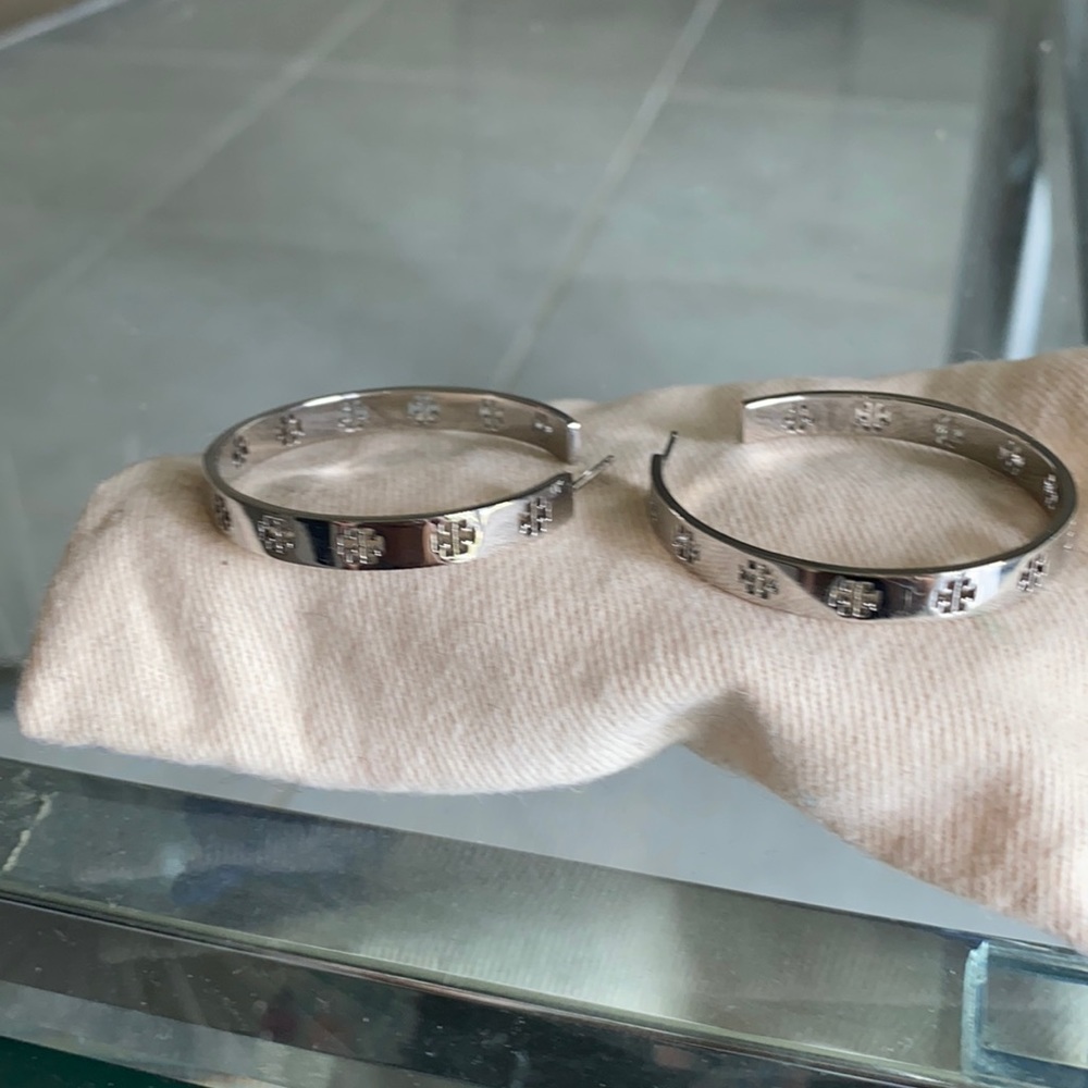 Tory Burch silver shop earrings.